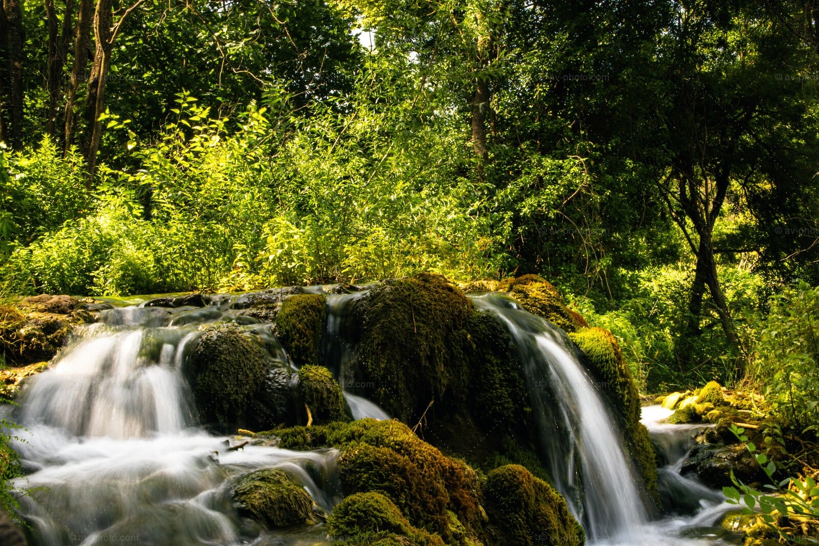 Sunlit Travertine Cascade